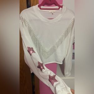 NWOT. Sold at Dry Goods. Brand is Baevely. Size Large Cropped.